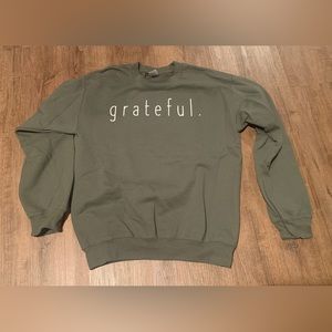 “Grateful” sweatshirt.